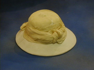 A lady's pith helmet by Thomas Townend & Co