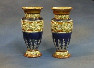 A pair of Royal Doulton salt glazed club shaped vases, the bases impressed Royal Doulton 1706 and impressed HA 9" 