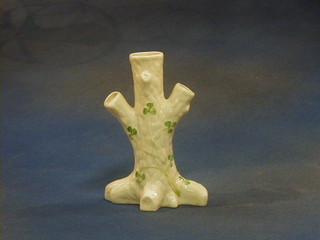 A Beleek pottery vase in the form of a tree stump, the base with green mark and RD No. 0857 