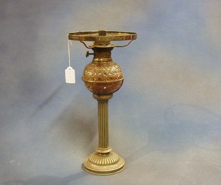 A cut glass oil lamp reservoir raised on a silver plated reeded column by Hewkin & Heath