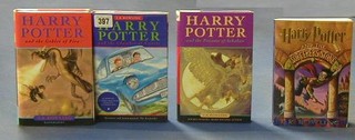 J K Rowling, 1 volume "Harry Potter and The Chamber of Secrets" hardback, "Harry Potter and The Prisoner of Azkaban" hardback and "Harry Potter and The Goblet of Fire" hardback, all with dust covers, together with a paperback edition "Harry Potter and the Sorcerers Stone" (4)