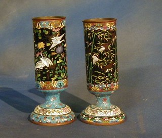 A pair of fine quality cloisonne enamelled vases raised on circular bases, 8"