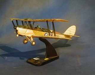 A wooden model of a WWI Tiger Moth