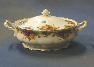 A 51 piece Royal Albert Old Country Rose pattern dinner/tea service comprising oval meat plate, 2 tureens and cover, sauce boat and stand, 8 10" dinner plates (1 cracked), 6 8" breakfast plates, 12 6" tea plates, 6 6" fruit bowls, twin handed sandwich plate, 6 cups and 6 saucers, sugar bowl, cream jug and teapot