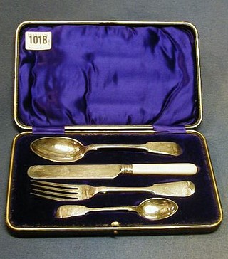 An Edwardian silver Old English pattern 4 piece christening set comprising knife, fork, spoon and teaspoon, contained in a presentation case Sheffield 1903 