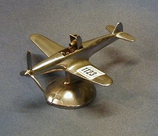 A Negbauer chromium plated table lighter in the form of an aircraft 