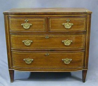 A Georgian mahogany bow front chest of 2 short and 2 long drawers, with crossbanded top and parquetry decoration inlaid to the drawers, raised on square tapering supports 36"