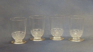 A set of 4 Lalique glasses, the bases decorated dolphins 3" (2 chipped) 