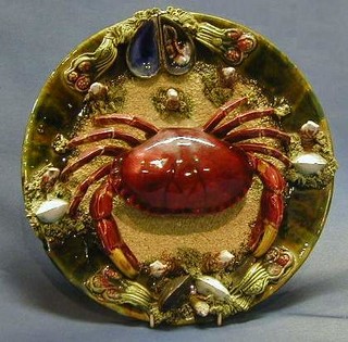 A Majolica plate decorated a crab and mussel shell 12" 