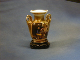 A 19th Century German porcelain twin handled vase decorated a card playing scene 5 1/2"