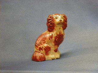 A 19th Century Staffordshire figure of a seated dog 6"