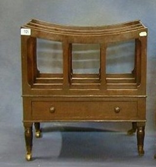 A 19th Century mahogany 3 division Canterbury, the base fitted a drawer and raised on turned supports 18"