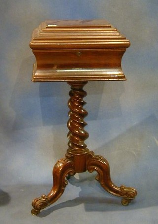 A Victorian mahogany teapoy raised on spiral turned and tripod supports 15"  