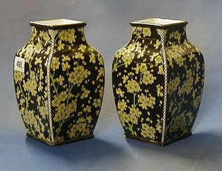 A pair of Royal Doulton square pottery vases with floral decoration, the bases marked Royal Doulton 75858 and incised 7423 8" (1 cracked and chipped) 