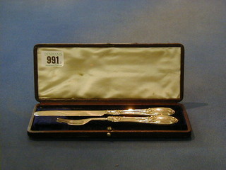 A Victorian silver christening set comprising knife and fork Sheffield 1853, cased