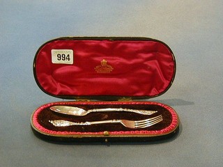 A Victorian silver christening set comprising spoon and fork London 1898