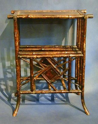 A 19th Century bamboo occasional table with base fitted a 3 division Canterbury 23"