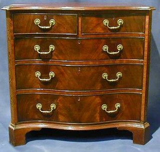 A Georgian mahogany serpentine fronted chest of 2 short and 3 long graduated drawers, raised on bracket feet 37"