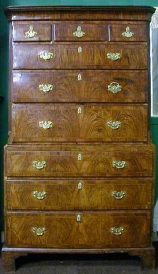 A fine Queen Anne walnutwood chest on chest with moulded cornice and canted corners, fitted 3 short drawers above 3 long drawers, the base fitted 3 long drawers, raised on bracket feet 39" wide