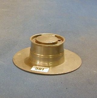 A circular pewter capstan inkwell 5"