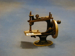 A childs Singer sewing machine