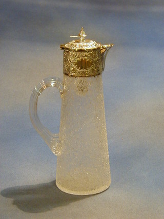 A 19th Century crackle glass claret decanter with silver plated mounts