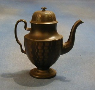 A black Basalt coffee pot