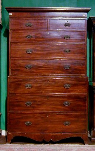 A Georgian mahogany chest on chest with moulded cornice above 2 short and 6 long graduated drawers, raised on splayed bracket feet 44"