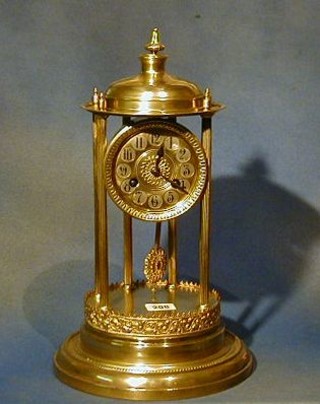 A 19th Century French 8 day striking mantel clock with drum movement and Arabic numerals supported by 4 pillars and contained under a glass dome (f)