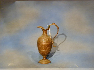 A Victorian bronze ewer 11"