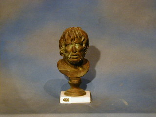 After the antique, a bronze head and shoulders bust of a classical man raised on a marble base (f)