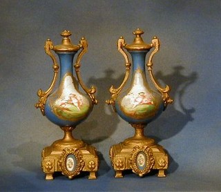 A pair of "Sevres" porcelain and gilt metal mounted urns 10"