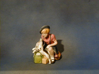 A Royal Doulton figure "Girl Evacuee" HN3203