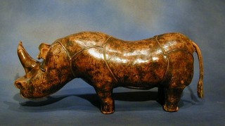 A leather foot stool in the form of a rhinoceros 30"