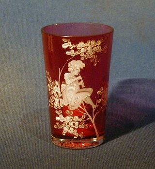 A "Mary Gregory" ruby glass beaker decorated a child amidst tree