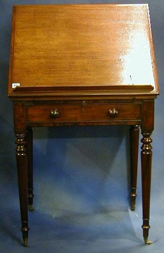 A Georgian mahogany architects table fitted a rising top, the front fitted a brushing slide and with a drawer to the side 26"