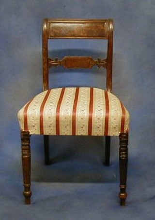 A set of 4 Georgian bar back dining chairs with shaped mid-rails and upholstered seats, on turned supports