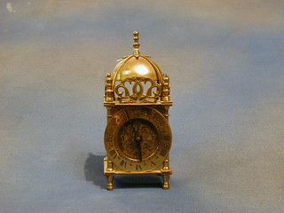 A 1930's brass lantern clock by Smiths 3"
