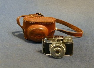 An Mycro IIIA miniature camera complete with leather case