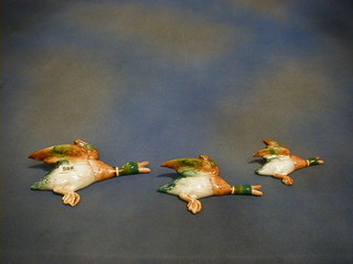 A set of 3 Beswick flying ducks, the backs impressed Beswick England 596-2,