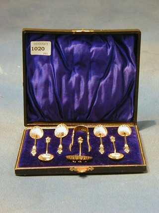 A set of 6 Victorian silver gilt apostle teaspoons, a matching pair of tongs and a sifter spoon