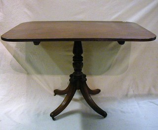 A Regency mahogany rectangular snap top breakfast table raised on pillar and tripod supports 45"