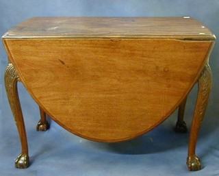 A Georgian Irish mahogany drop flap gateleg dining table raised on carved cabriole claw and ball supports 41"