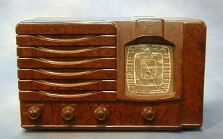 A brown Bakelite Westminster model ZA617 radio