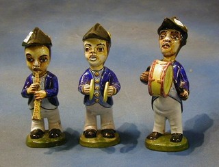 3 Continental Majolica bandsmen, the base impressed Ceramicas V Mora (Hijo) Manises