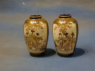 A pair of 19th Century Japanese Satsuma pottery vases with panelled decoration decorated court figures 5"