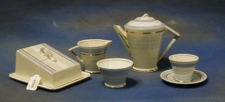 A 1930's Art Deco 39 piece Palissy china tea/coffee service comprising twin handled bread plate, cheese dish, coffee pot, cream jug and sugar bowl, 6 coffee cups and 6 saucers, 4 tea cups and 6 saucers, sugar bowl and cream jug, 6 tea plates, 6 side plates