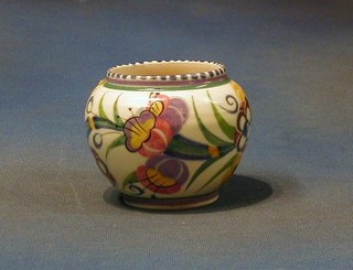 A circular Poole Pottery vase with floral decoration, the base impressed Poole England and marked ED 4"