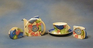 A 21 piece Clarice Cliff Fantasque "Blue Chintz" pattern tea service comprising teapot (stained to the inside) sugar bowl, cream jug (chip to rim), matching 3" beaker, 6, 6" tea plates, 6 cups (1 cracked), 5 saucers (1 crazed), the bases marked Fantasque hand painted  Bizarre by Clarice Cliff Newport Pottery England