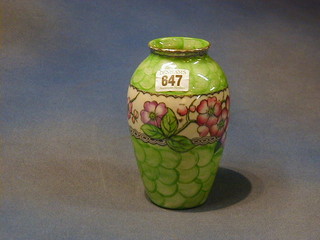 A green lustre glazed and floral decorated Malingware vase, the base marked 4481 161 7"